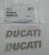 Par de emblemas originales Ducati color gris